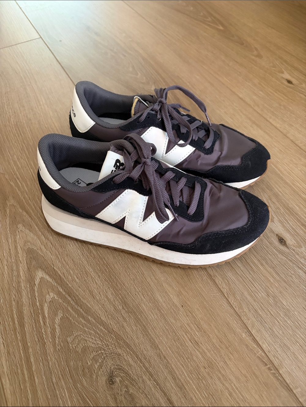 New Balance Lace-Up Sneakers in Black and White